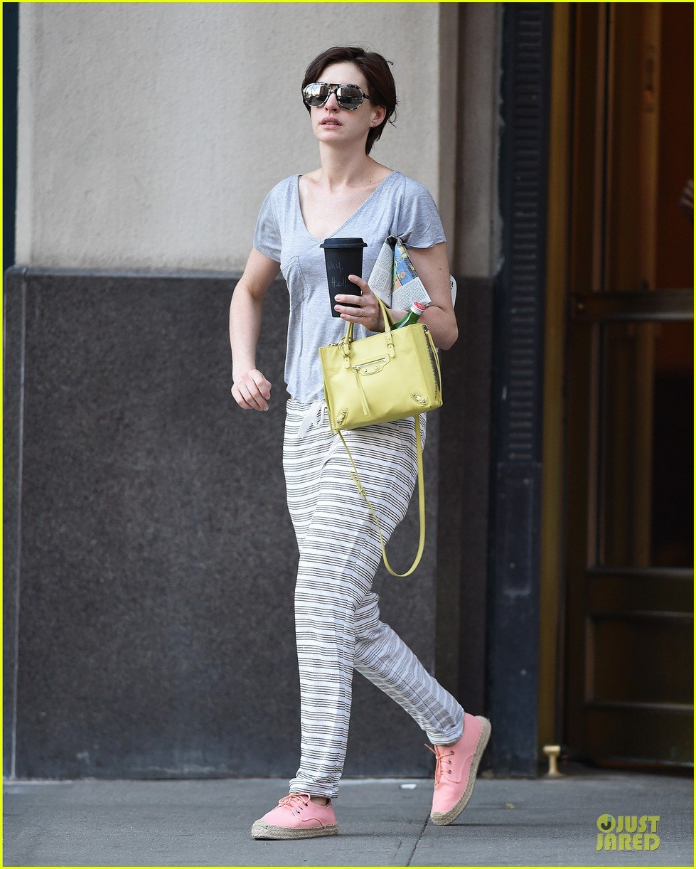 anne hathaway gets down to business with andrew rannells 013138746
