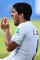 luis suarez banned from world cup for biting opponent 10
