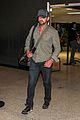 gerard butler shows off chest hair touching down at lax 01