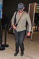gerard butler shows off chest hair touching down at lax 02