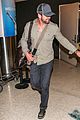 gerard butler shows off chest hair touching down at lax 03