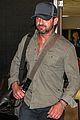 gerard butler shows off chest hair touching down at lax 04
