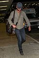gerard butler shows off chest hair touching down at lax 07