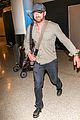 gerard butler shows off chest hair touching down at lax 10