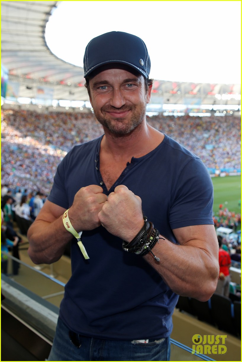 gerard butler packs on pda with mystery gal world cup 023156006