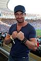 gerard butler packs on pda with mystery gal world cup 02