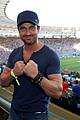 gerard butler packs on pda with mystery gal world cup 07