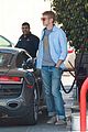 hayden christensen licks his lips while fueling his car 01