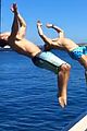 zac efron goes shirtless backflip off a boat 03