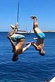 zac efron goes shirtless backflip off a boat 04