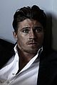 garrett hedlund dishes what he learned from brad pitt 02