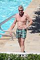 joe simpson hits the pool with a much younger man 01