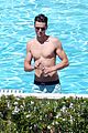 joe simpson hits the pool with a much younger man 02