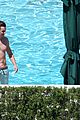 joe simpson hits the pool with a much younger man 14