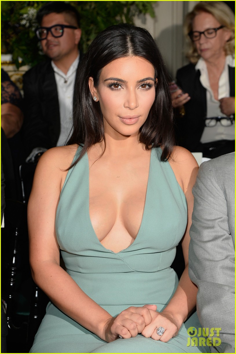 kim kardashian displays lots of cleavage for valentino fashion show 093152334