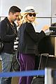 diane kruger wears purple pants at lax airport 02
