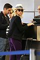 diane kruger wears purple pants at lax airport 06