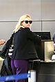 diane kruger wears purple pants at lax airport 09