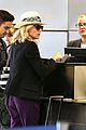 diane kruger wears purple pants at lax airport 12