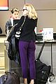 diane kruger wears purple pants at lax airport 13