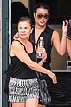 lea michele flashes her lacy white bra while shopping with her mom 11