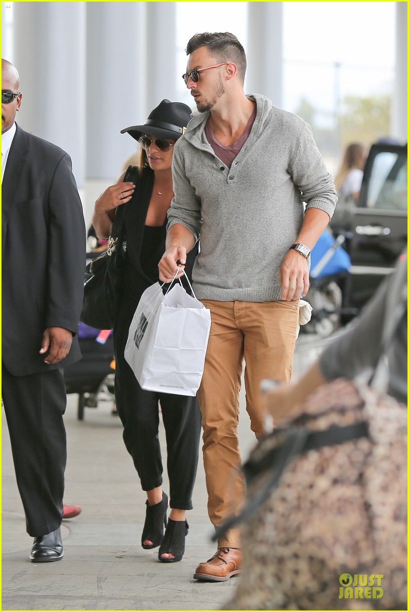 lea michele matthew paetz hold hands at lax 053156905