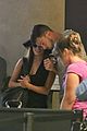 lea michele matthew paetz hold hands at lax 04