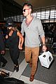 lea michele matthew paetz hold hands at lax 21