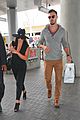 lea michele matthew paetz hold hands at lax 28
