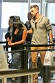 lea michele matthew paetz hold hands at lax 29