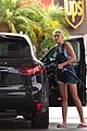 miley cyrus picks something off the ground gas station 16