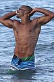 shemar moore shirtless flexes muscles beach 01