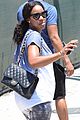 kelly rowland displays her bare baby bump during gym workout 07