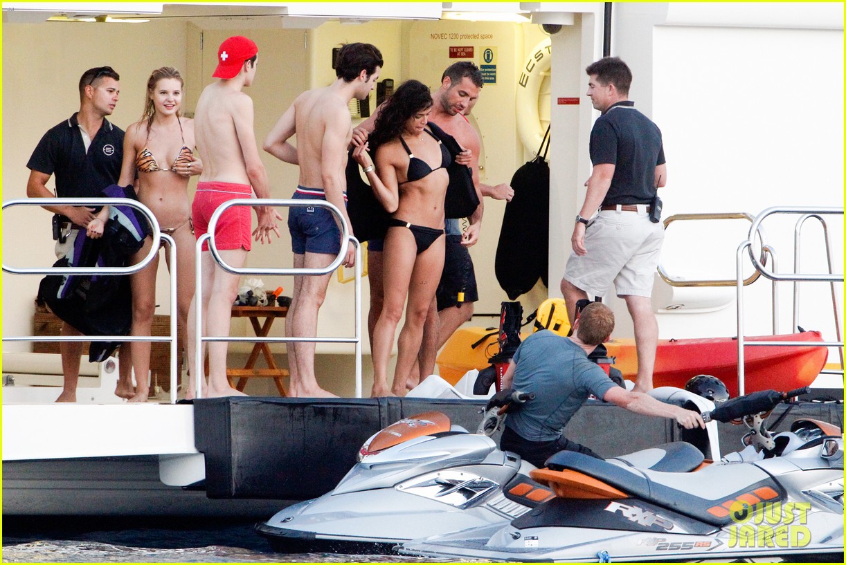 zac efron goes shirtless for jet ski fun with michelle rodriguez 21