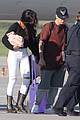 justin bieber selena gomez hold hands upon arrival in canada 01