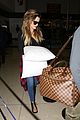 khloe kardashian touches down at lax with scott disick after hosting together 08