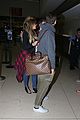 khloe kardashian touches down at lax with scott disick after hosting together 09