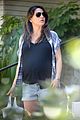 mila kunis shows off her baby bump in short shorts 04