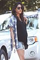 mila kunis shows off her baby bump in short shorts 09