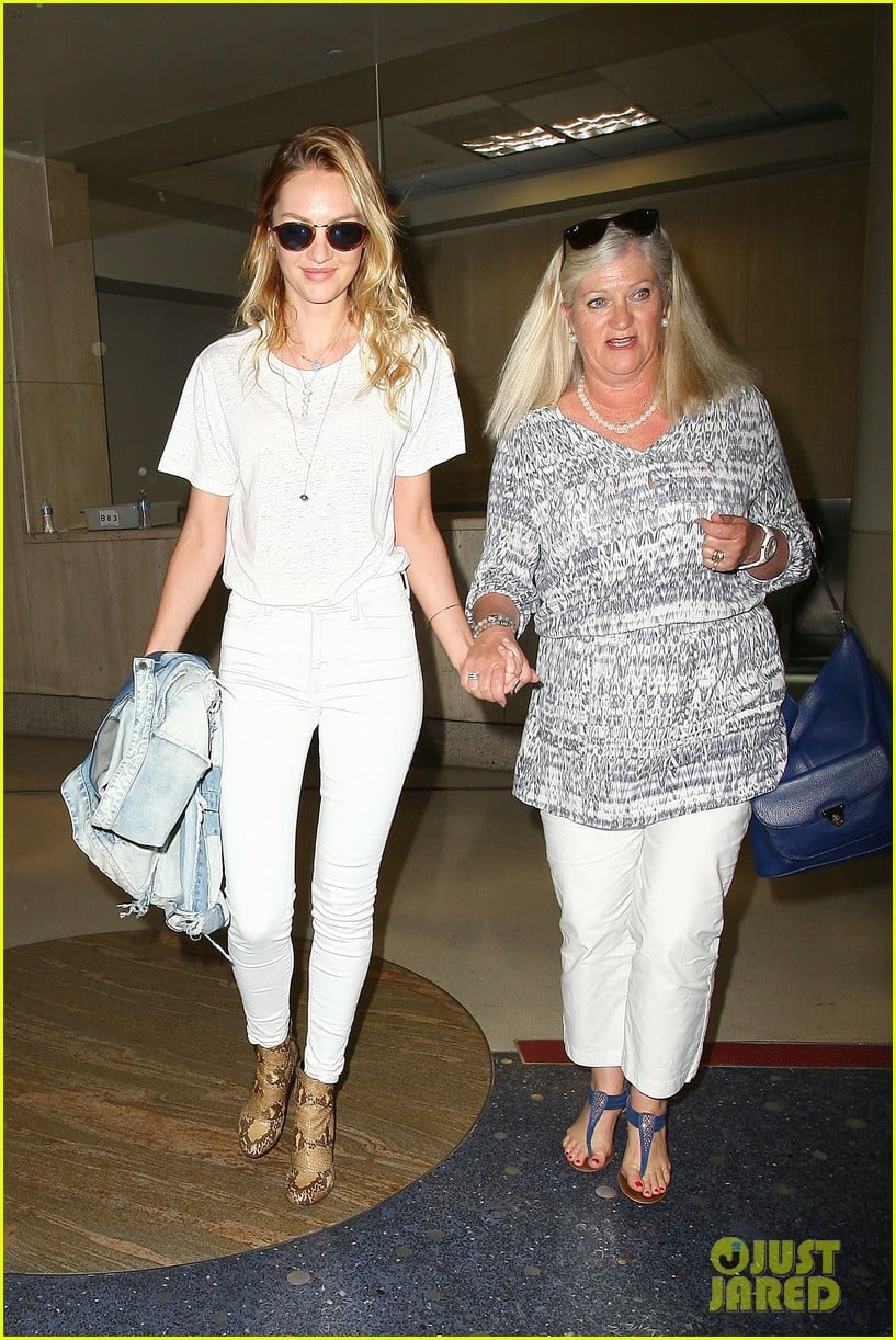 candice swanepoel eileen hold hands at lax airport 023205876