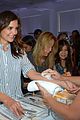katie holmes gets temporary tattoos at joe zee nyfw event 05