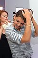 katie holmes gets temporary tattoos at joe zee nyfw event 20