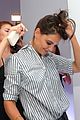 katie holmes gets temporary tattoos at joe zee nyfw event 22