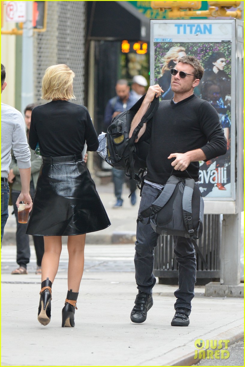 sam worthington lara bingle step out after being sued 053196540