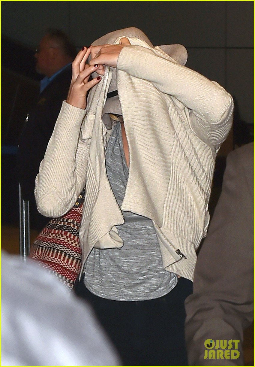 jennifer lawrence touches down at lax after serena 08
