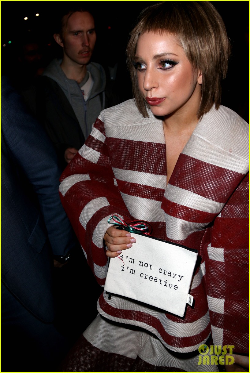 lady gaga holds a sign saying im not crazy 043250125
