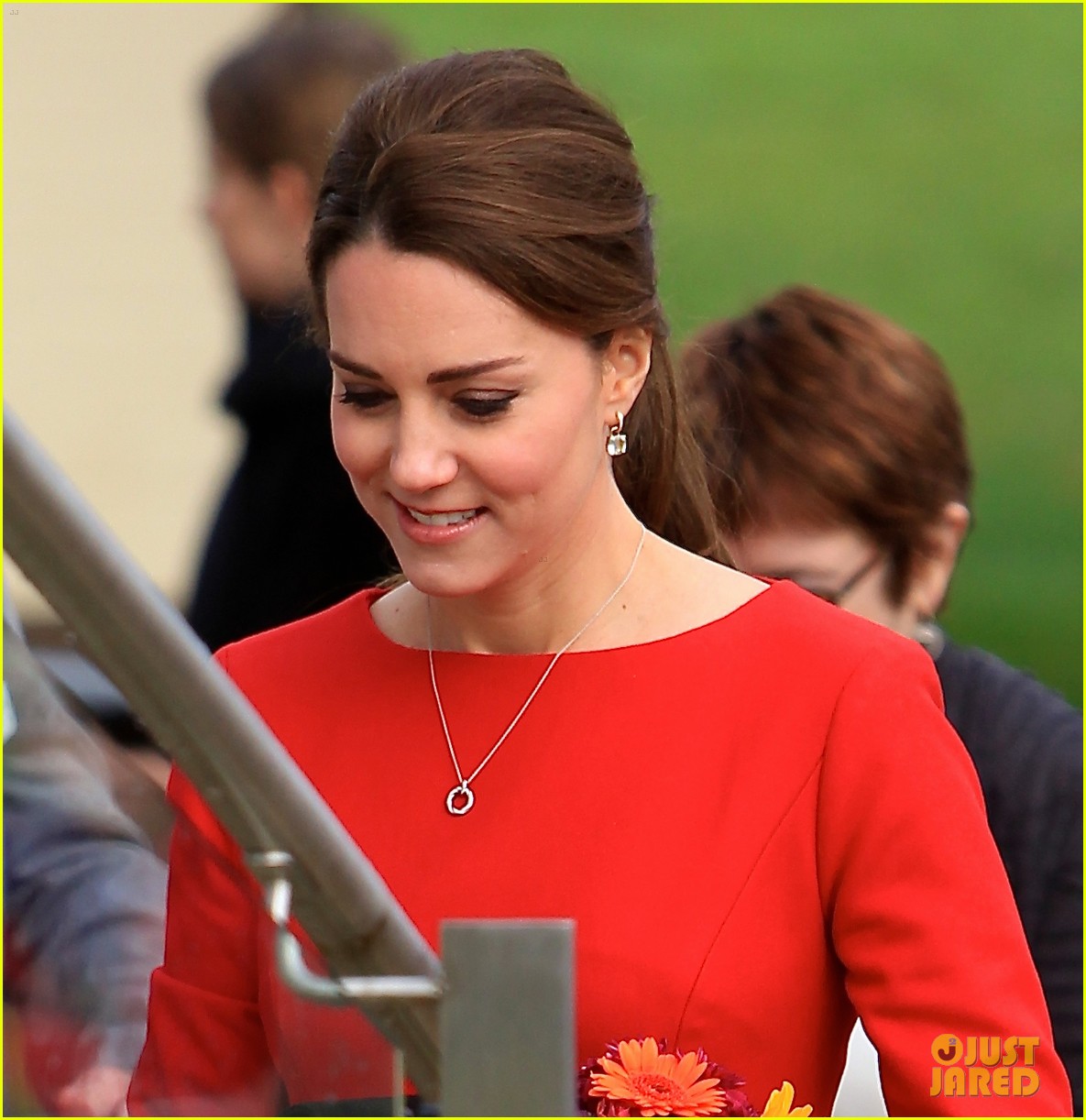 kate middleton shows tiny baby bump in red dress 043249751