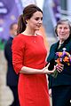 kate middleton shows tiny baby bump in red dress 02