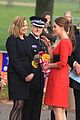 kate middleton shows tiny baby bump in red dress 03