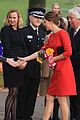 kate middleton shows tiny baby bump in red dress 07